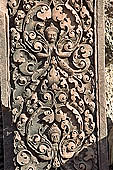 Banteay Srei temple - ancillary building of the causeway close-up of the sandstone pilaster